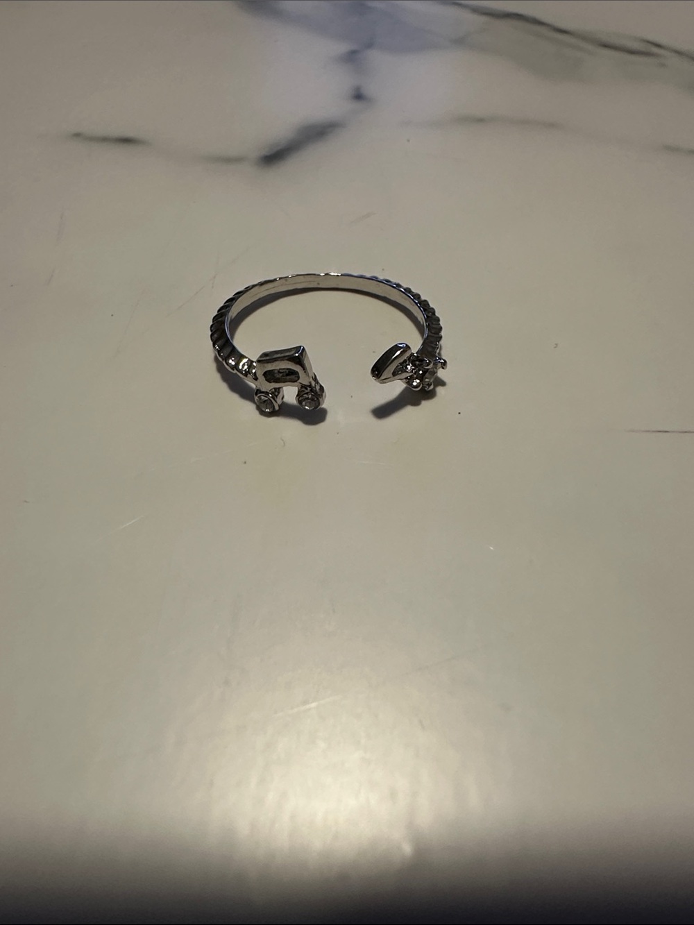 Silver Tone Adjustable Ring with Music Note Crystal Accents